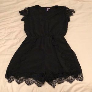 Black romper Francesca boutique